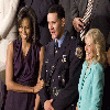 Hero cop, who sat next to the first lady, charged with rape